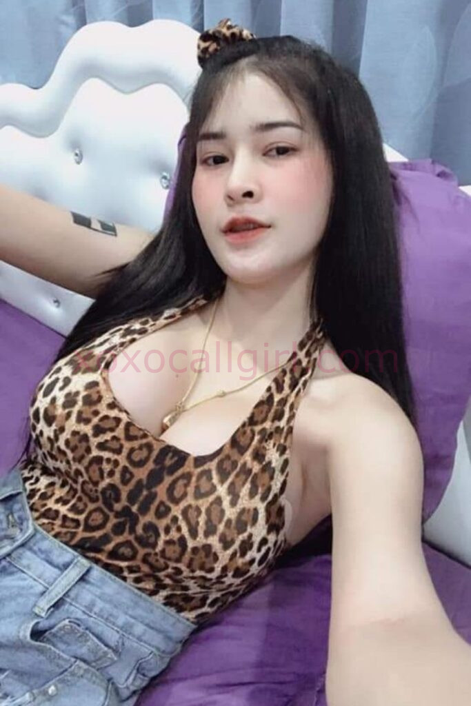 KL Escort Girl Woman in black dress holding "Local Escort Girl.com" sign. Local Escort Girl text graphic. Malaysia Sex Service