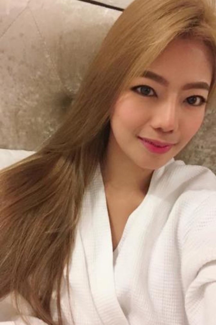 KL Escort Girl Woman in white robe with long blonde hair Malaysia Sex Service