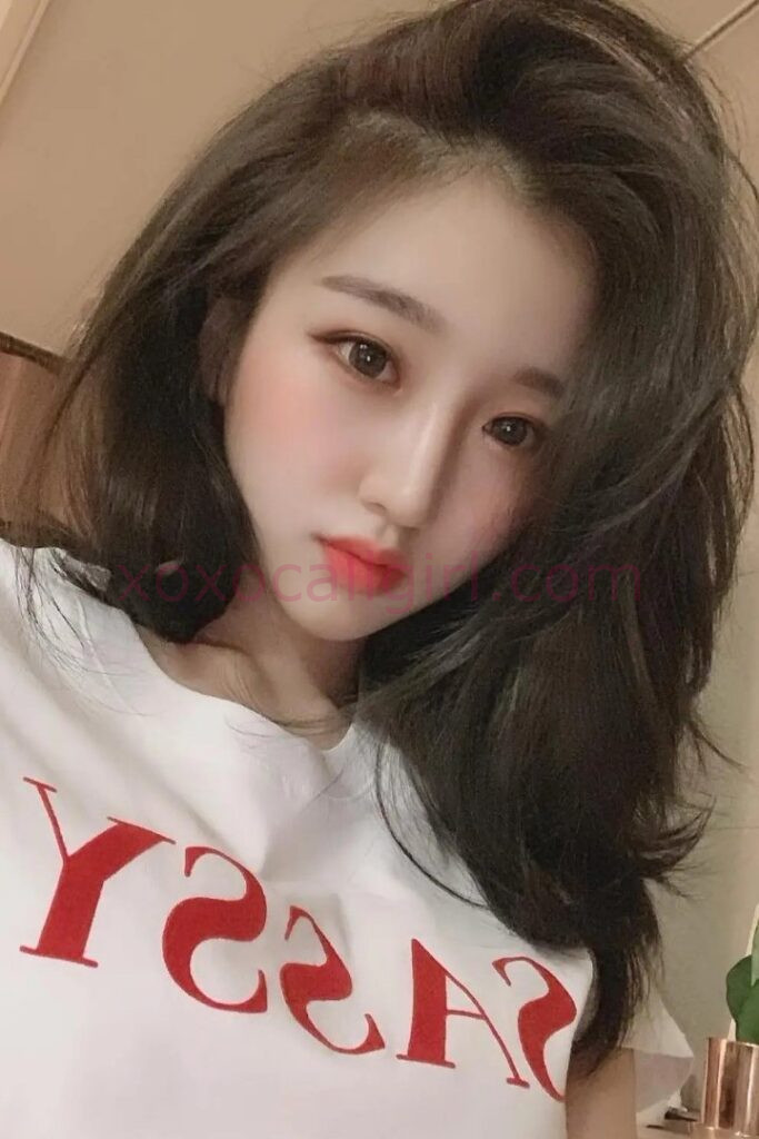 KL Escort Girl Beautiful Chinese escort with dark hair, promoting Incall Escort Kuala Lumpur services. Malaysia Sex Service