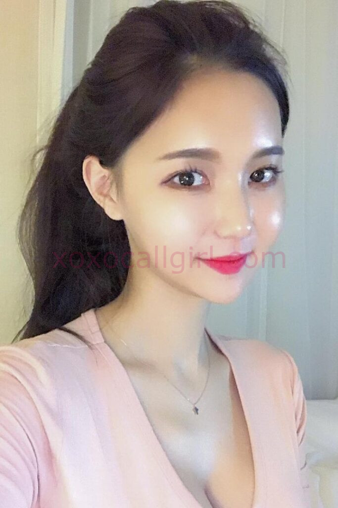 KL Escort Girl Fiona, Chinese Escort KL Outcall, looking at the camera with a slight smile. Malaysia Sex Service