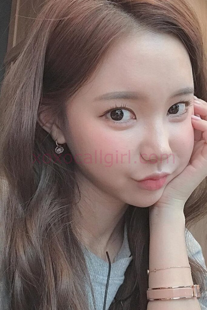 KL Escort Girl Close-up of a pretty Asian woman, possibly a sex escort Kuala Lumpur. Malaysia Sex Service