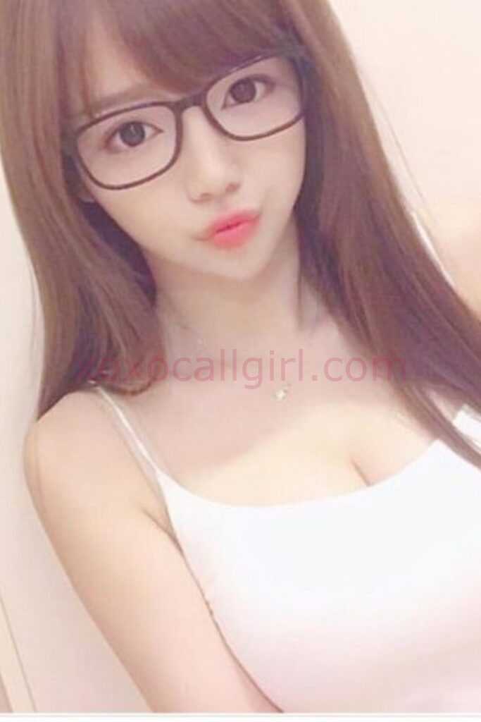 KL Escort Girl Attractive Asian woman with glasses, possibly a local Chinese escort in Kuala Lumpur. Malaysia Sex Service