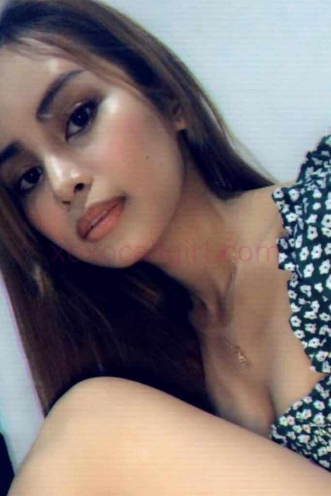 KL Escort Girl Malay Escort Amoi advertisement with woman holding a sign for Escortamoi.com. Malaysia Sex Service