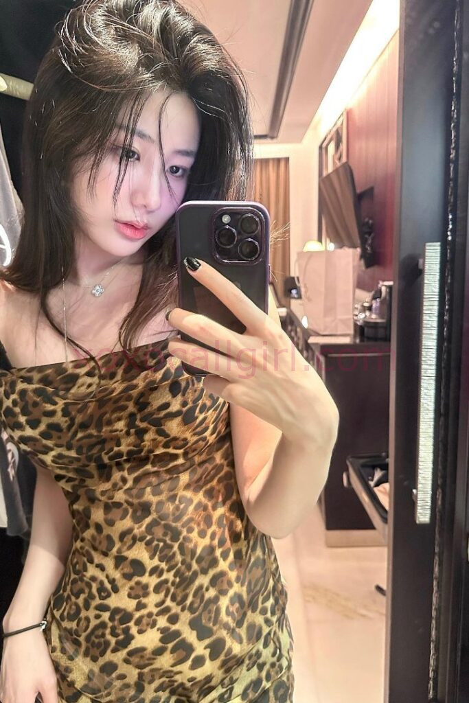 KL Escort Girl Woman in red lace lingerie. Elegant and sensual bedroom attire. Malaysia Sex Service