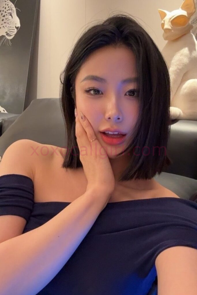 KL Escort Girl Woman in red lace lingerie. Elegant and sensual bedroom attire. Malaysia Sex Service