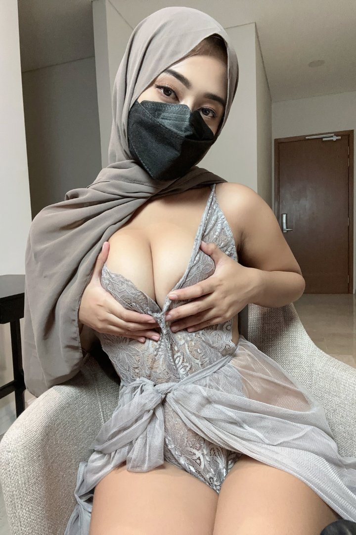 KL Escort Girl Woman in hijab and mask wearing lingerie. Malaysia Sex Service