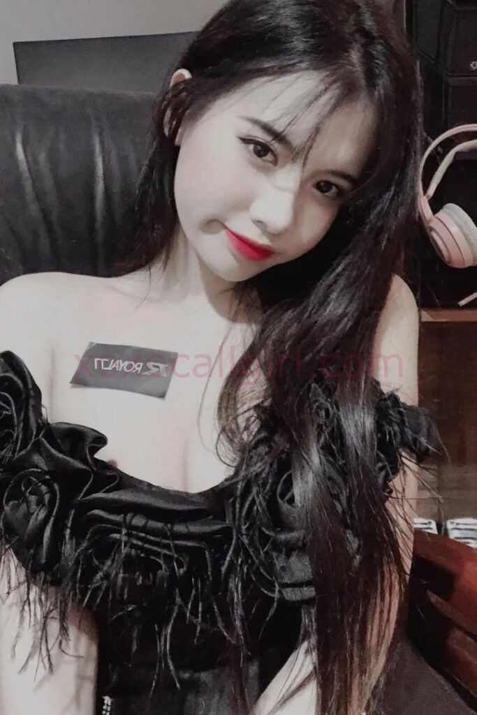 KL Escort Girl Vietnam Escort Sally in Kuala Lumpur, wearing a black dress. Malaysia Sex Service