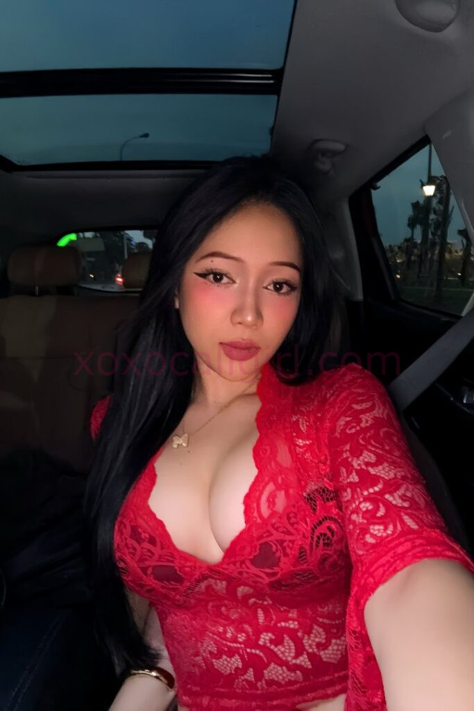 KL Escort Girl Malay Escort in Kuala Lumpur, wearing red lace top in car. Malaysia Sex Service
